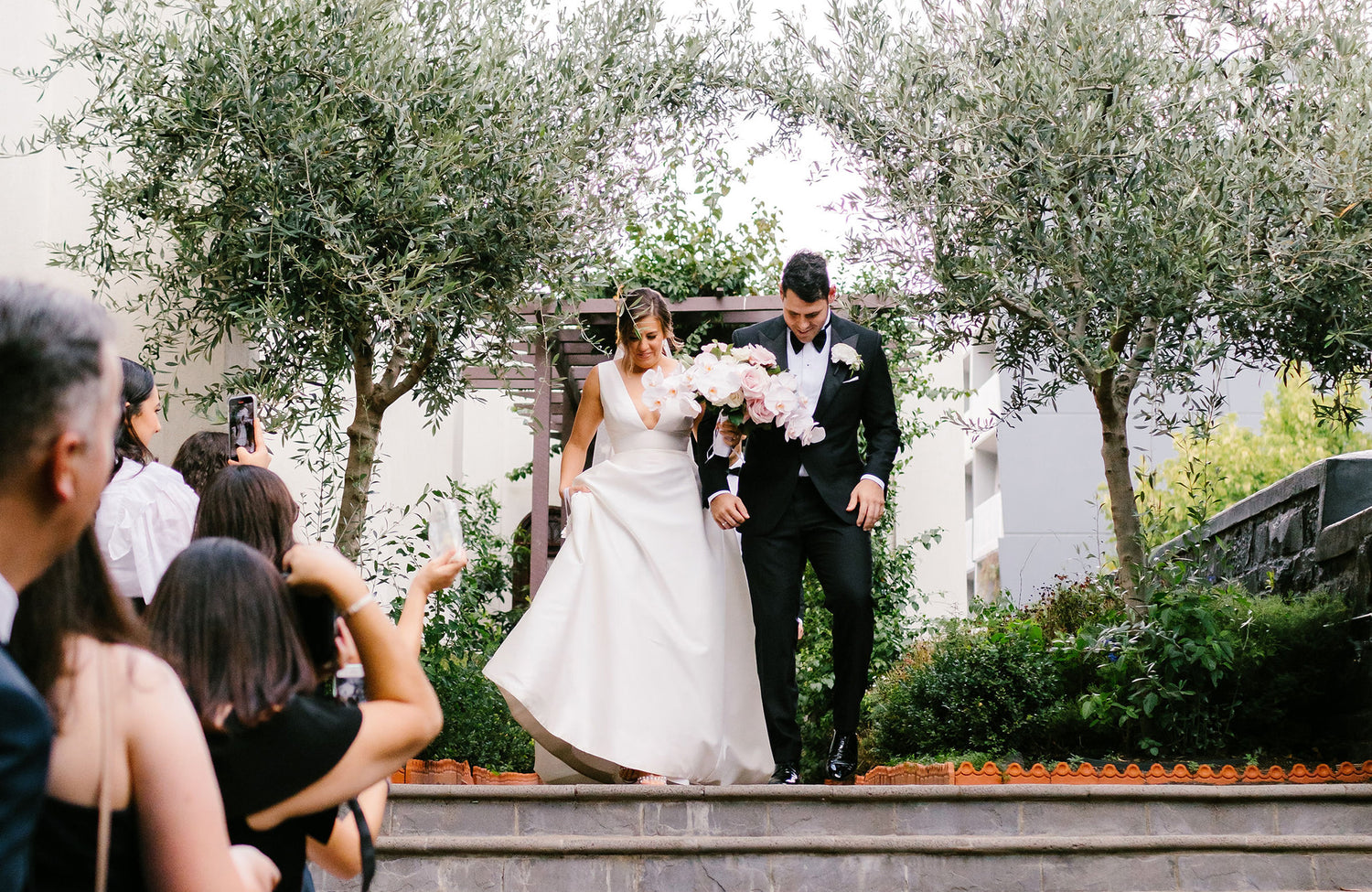 Wedding Flowers Melbourne Bride and Groom Walking in Garden