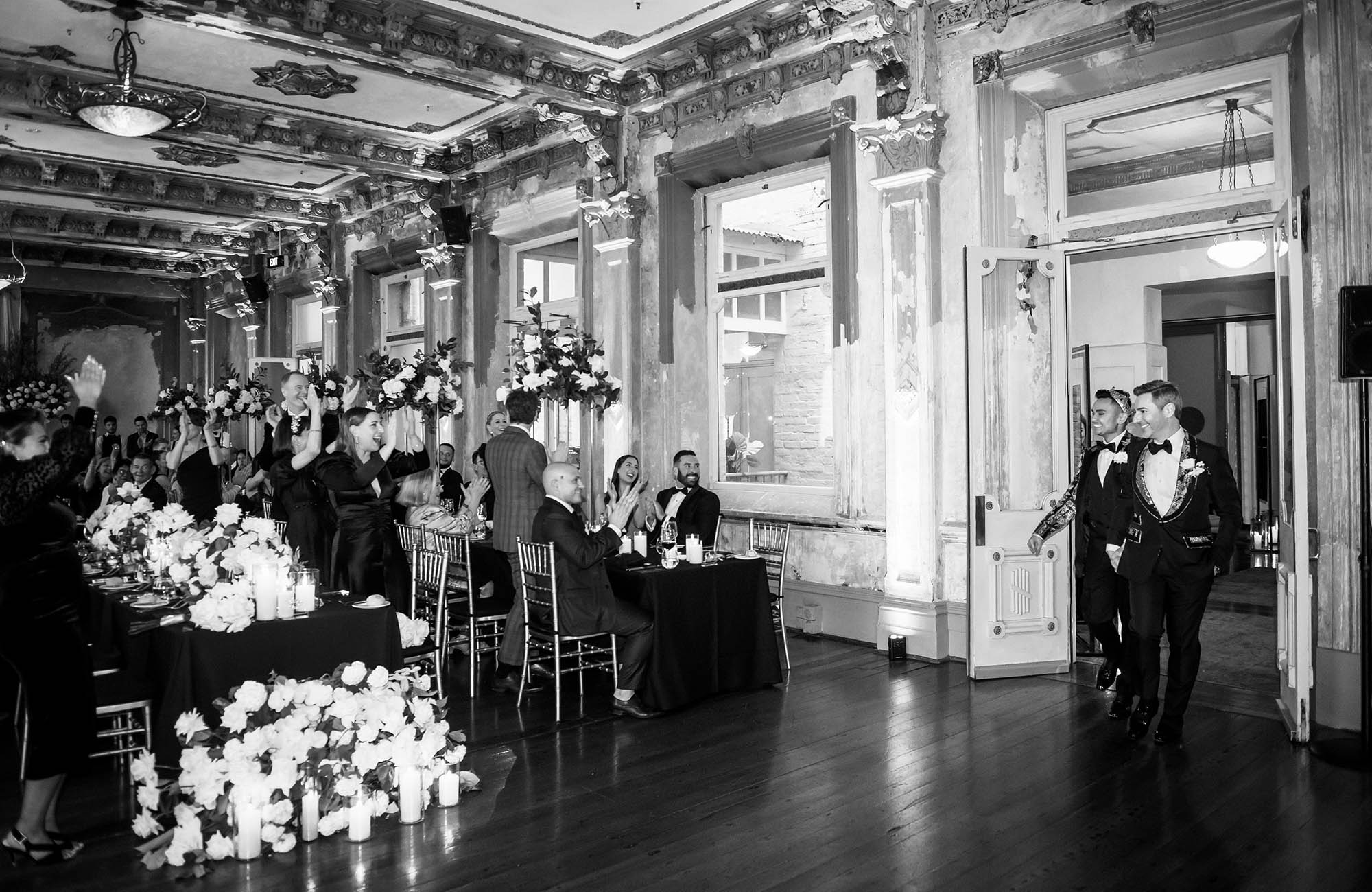 Groom and Groom entering wedding reception in Melbourne