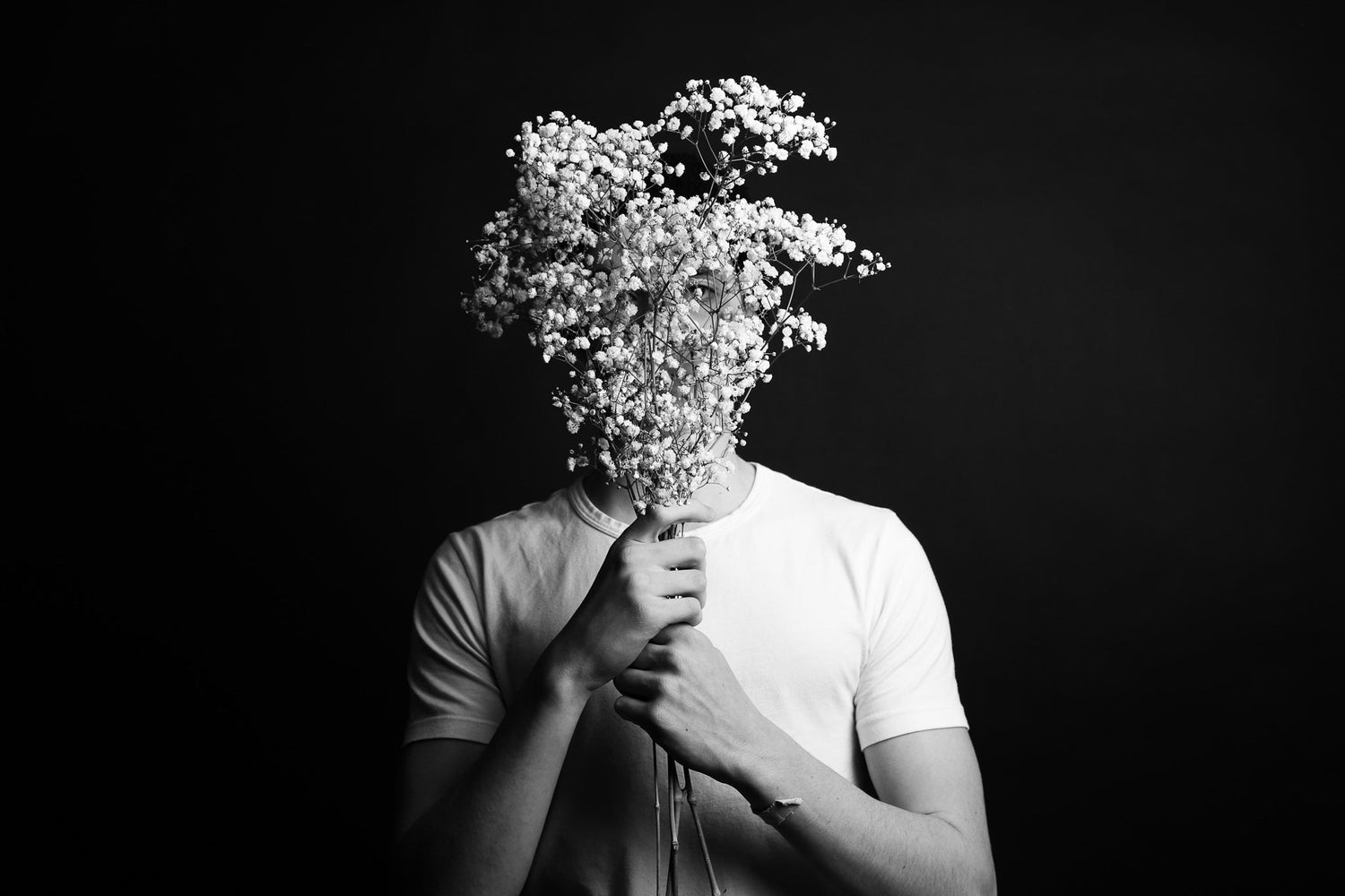 Man holding flowers