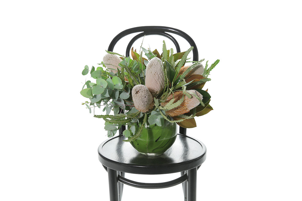Kate Hill Flowers – native ball-vase design with Banksia, Protea, eucalyptus and magnolia foliage.