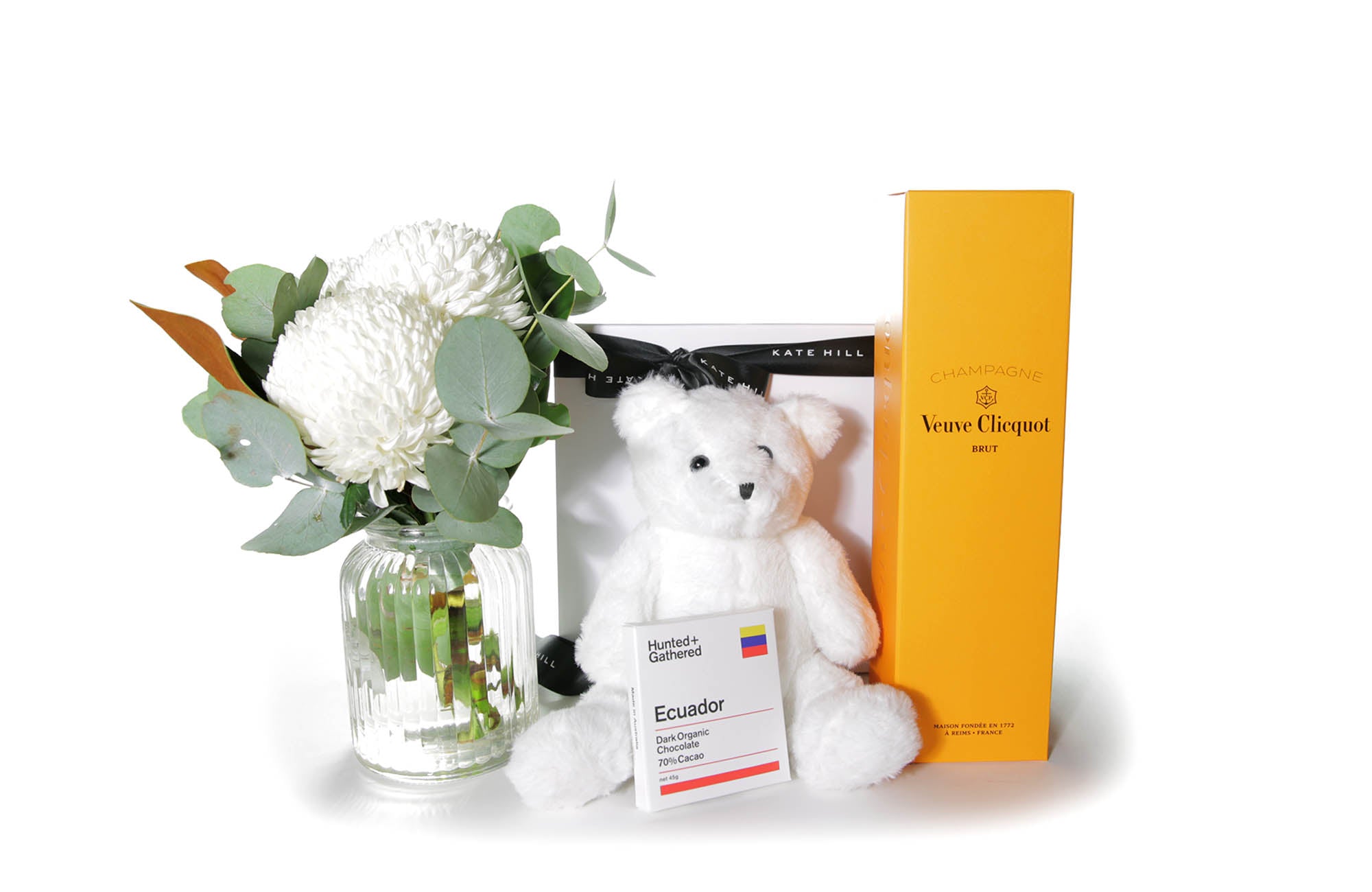 Flower gift box hamper featuring a chic flower vase design, chocolate, French Champagne and a teddy bear.
