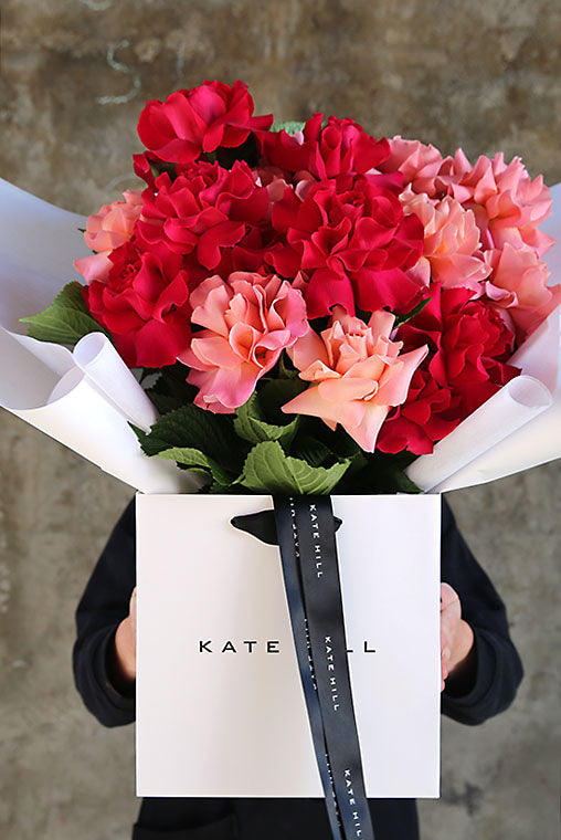 Pink and red flower bouquet in Kate Hill Flower bag for delivery to Caulfield
