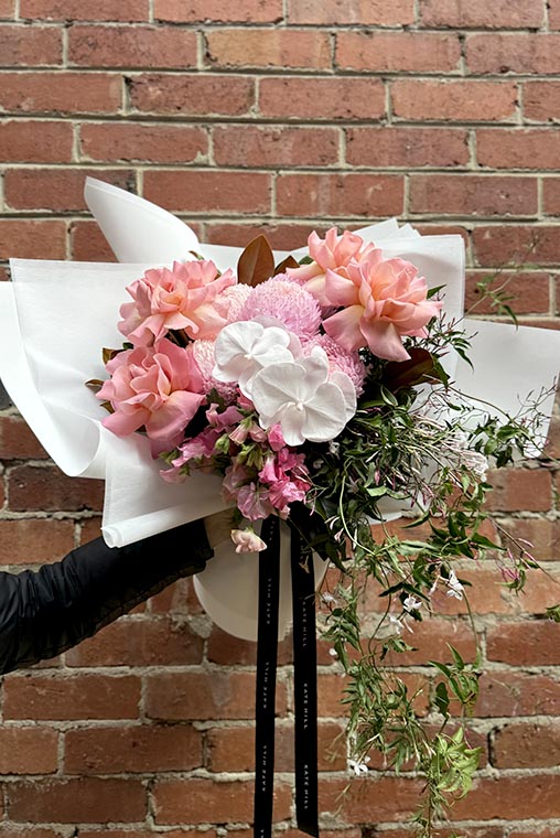 Pastel bouquet with luxury wrapping by florist Kate Hill
