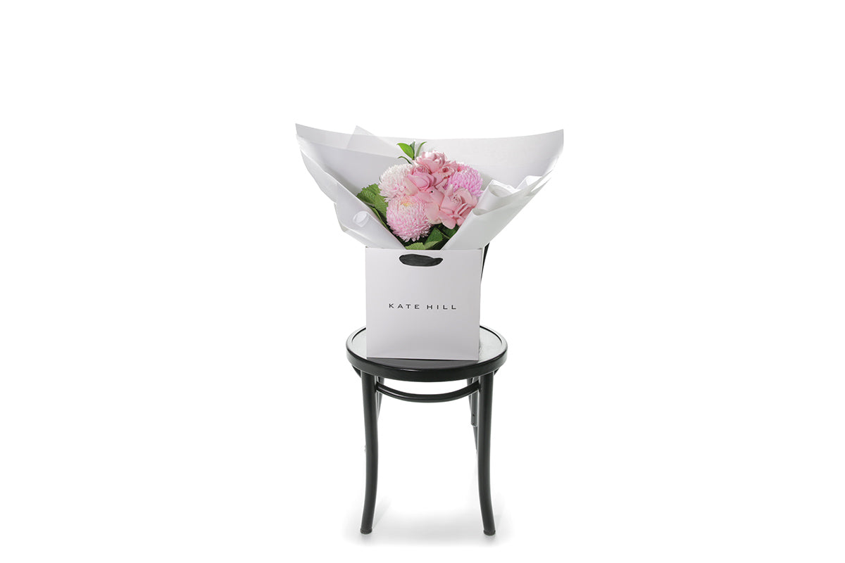 Kate Hill Flowers – small blush pink birthday posy with roses, disbuds and foliage hand-tied.