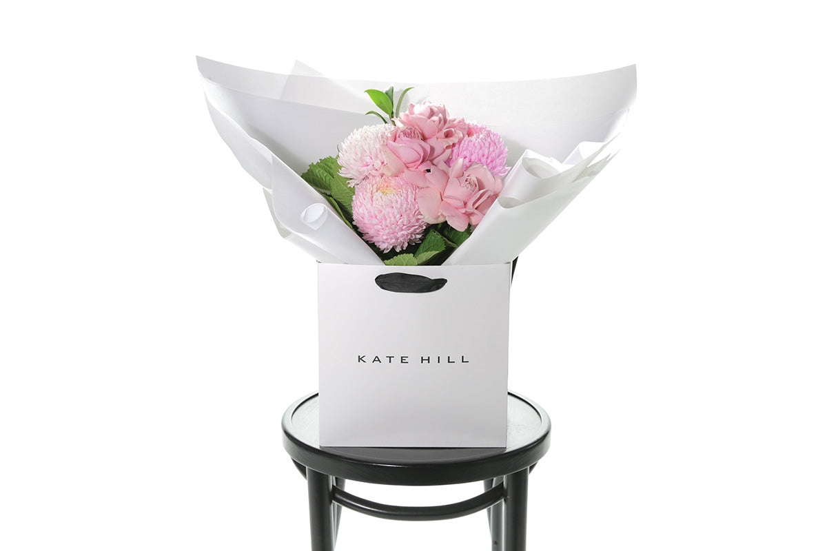 Kate Hill Flowers – small blush pink birthday posy with roses, disbuds and foliage hand-tied.