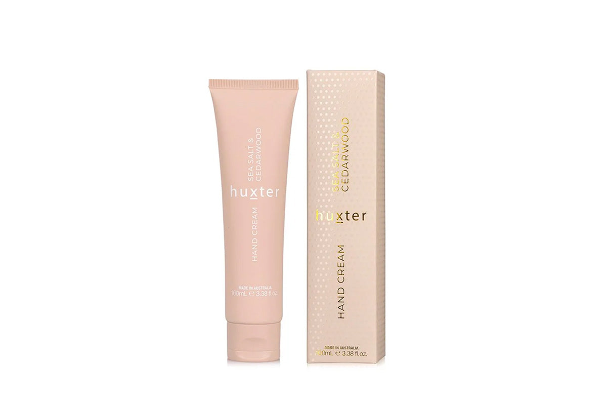 Huxster hand cream and packaging on a white background.