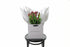 Kate Hill flower bag sitting on a black bentwood chair, displaying fresh premium pink tulip bouquet. Bouquet of 20 stems of pink barcelona tulips in image.
