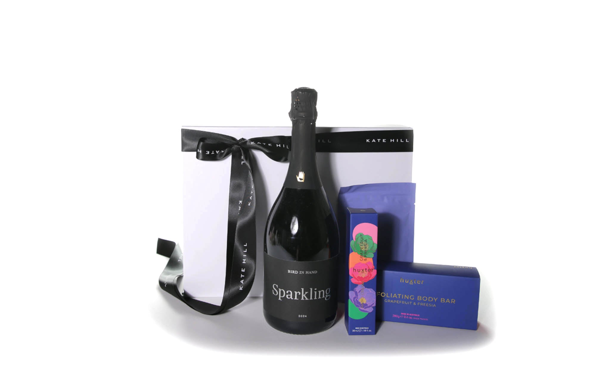 Flower gift box hamper with sparkling wine and body care