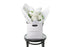 A small posy flower bouquet of white disbuds and a hint of foliage. Bouquet wrapped in beautiful white signature wrapping in flower bag. Bouquet bag sitting on a black bentwood chair with white wall background.