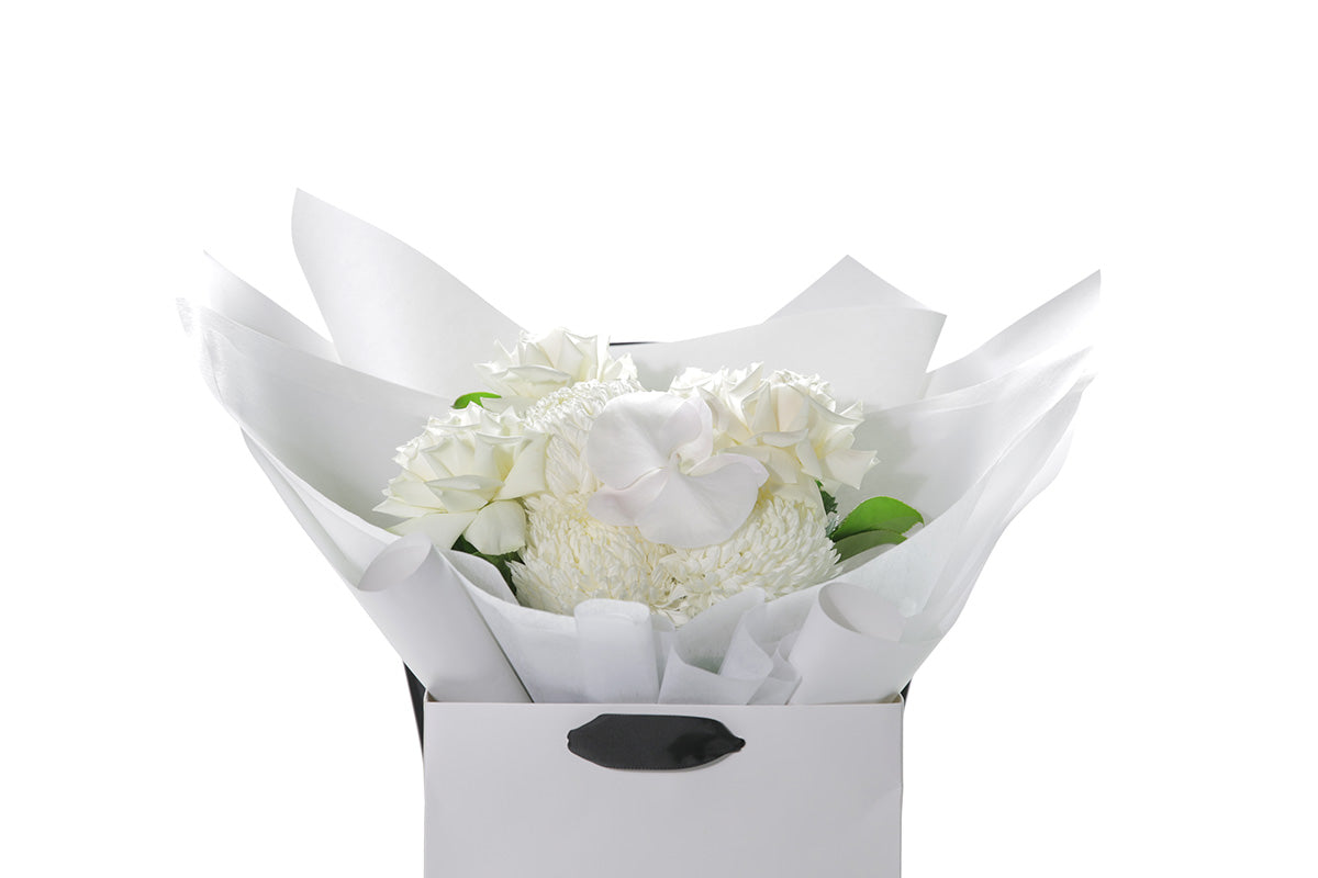 Kate Hill Flowers – medium birthday bouquet of white roses, hydrangeas, orchids and seasonal blooms hand-tied.