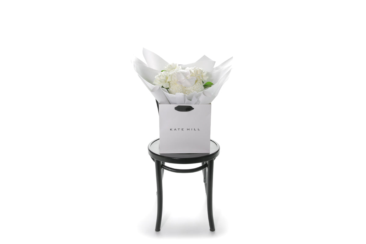 Kate Hill Flowers – medium birthday bouquet of white roses, hydrangeas, orchids and seasonal blooms hand-tied.