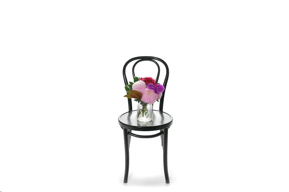 Kate Hill Flowers – small ribbed jar with pink chrysanthemum, hot-pink rose or orchid bloom, ready for birthday gifting.