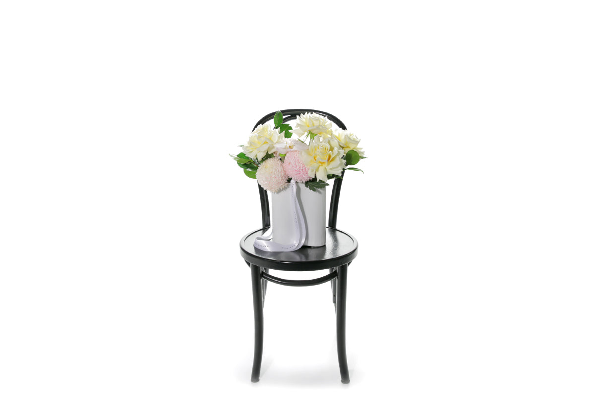 Kate Hill Flowers – pastel wave vase with pink chrysanthemums, lemon roses and blush orchids.