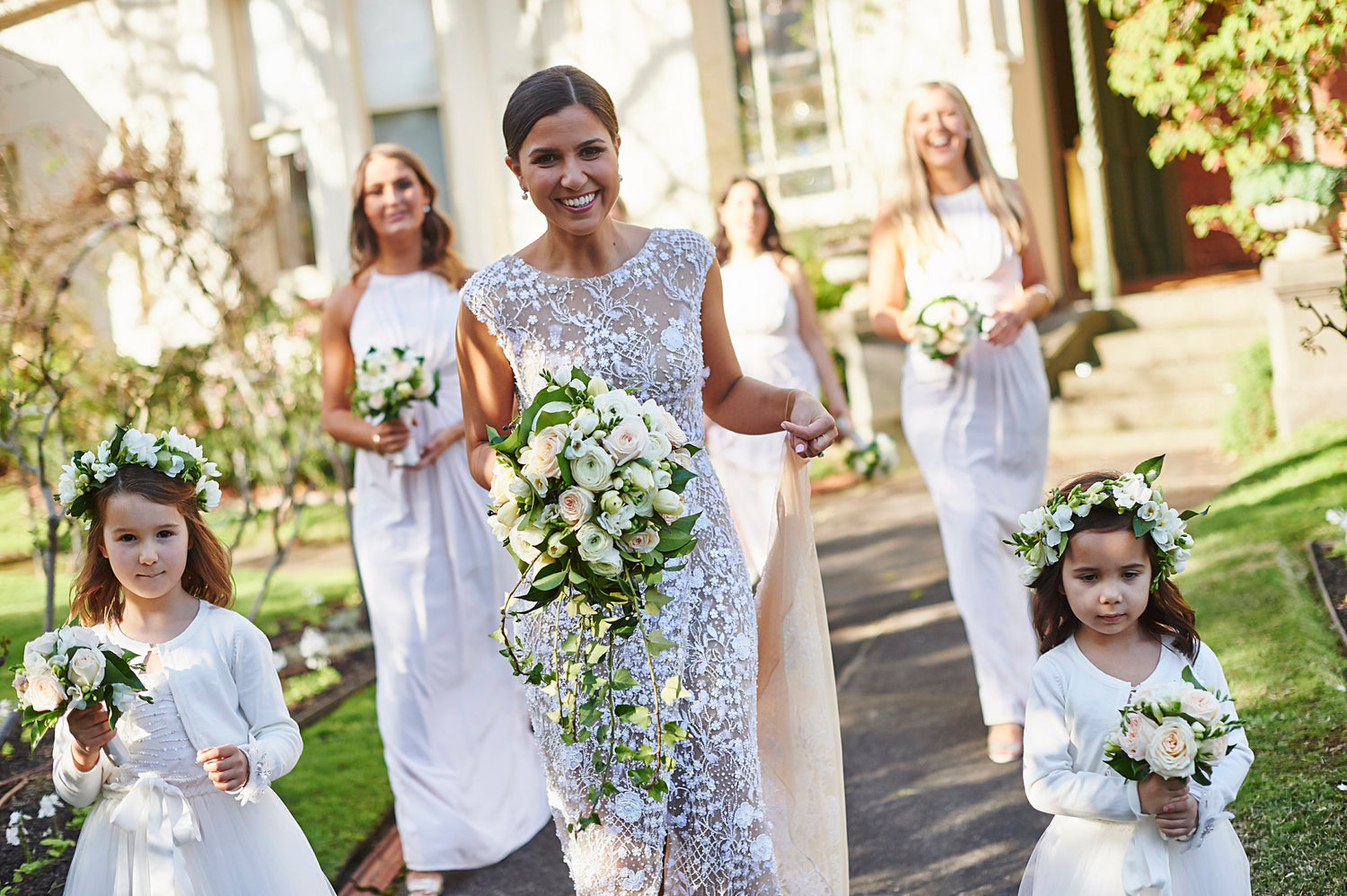 Bridal Party holding bouquets from Melbourne Wedding Florist Kate Hill