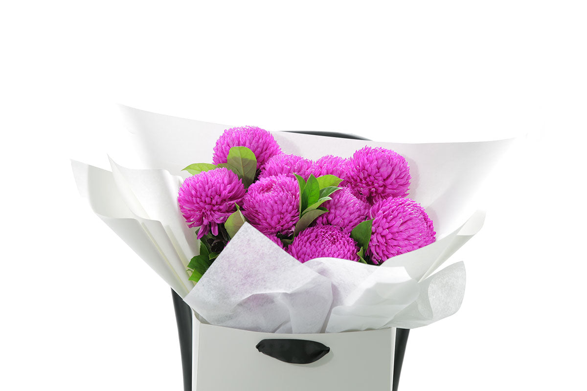 Close-up of ARIA bouquet with hot pink chrysanthemum disbuds