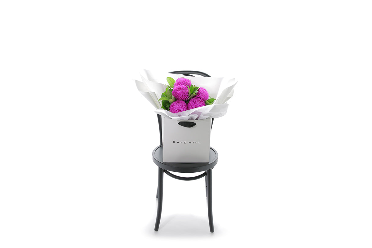 ARIA small hot pink disbud bouquet in Kate Hill Flowers signature wrapping