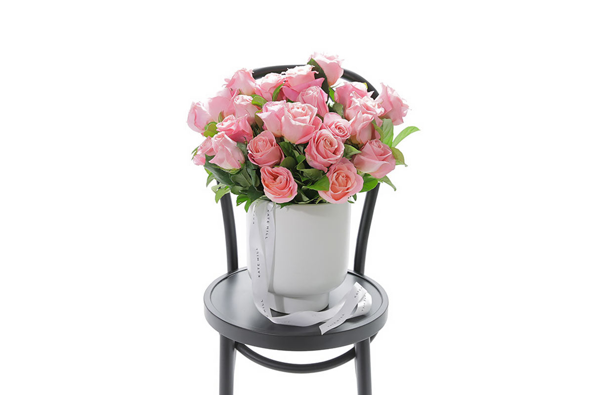 HERMOSA watermelon roses in a white footed ceramic design by Kate Hill Flowers Melbourne