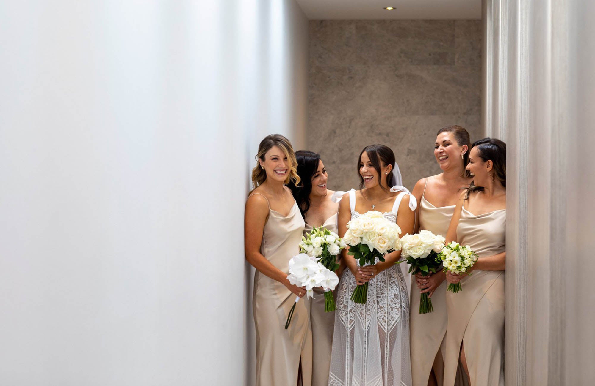 Bridal party in Melbourne all holding bridal bouquets