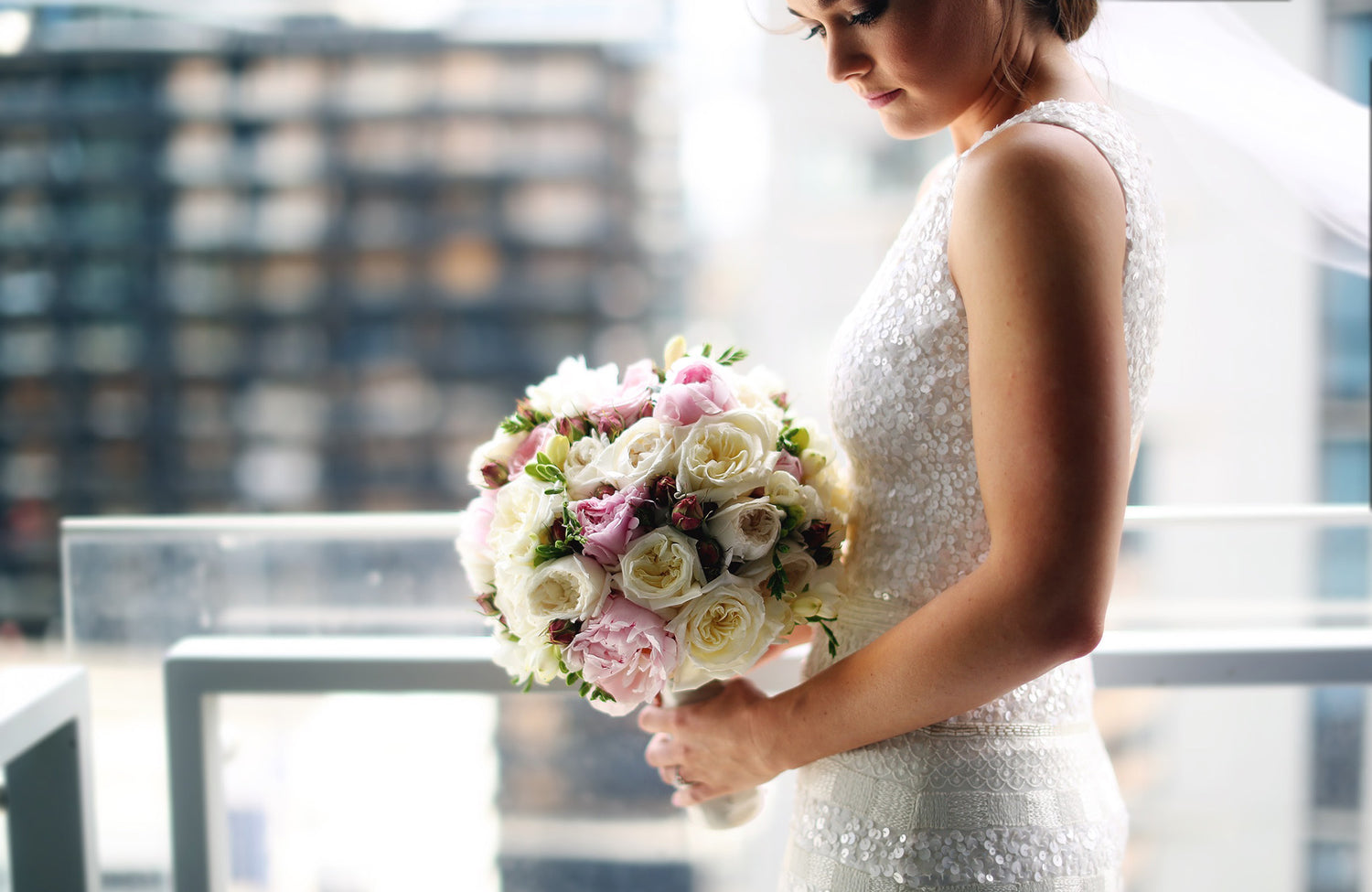 Bride holding bridal bouquet wedding flowers