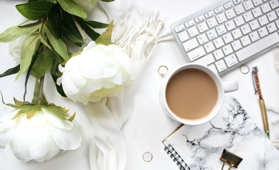 Flowers placed on work desk