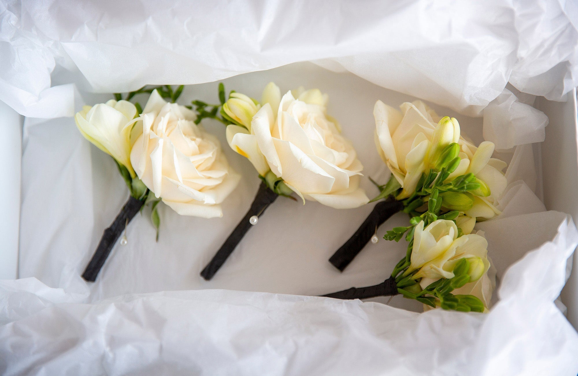 Wedding Buttonholes in Packing being delivered on wedding day