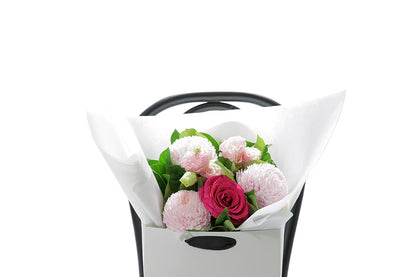 Close-up of HARPER small bouquet with soft pink and blush seasonal blooms
