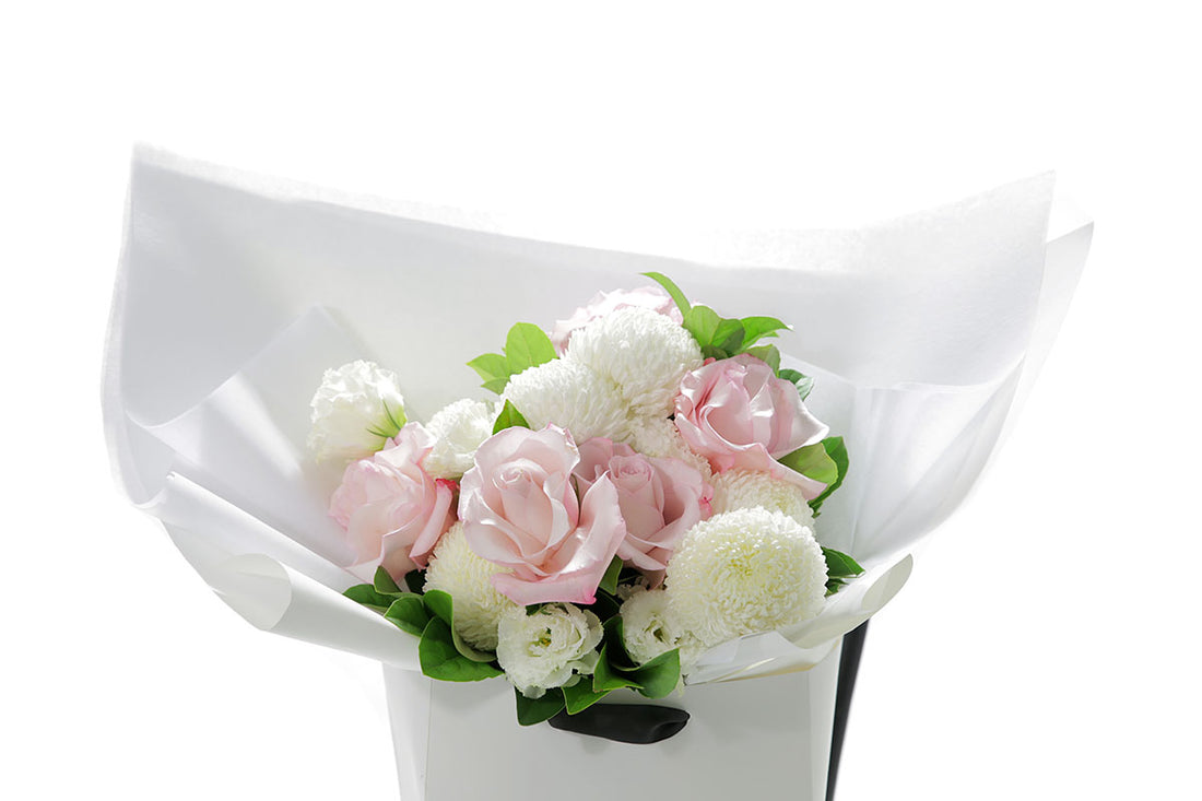 Close up of SERENITY small pastel flower bouquet in blush and white by Kate Hill Flowers Melbourne