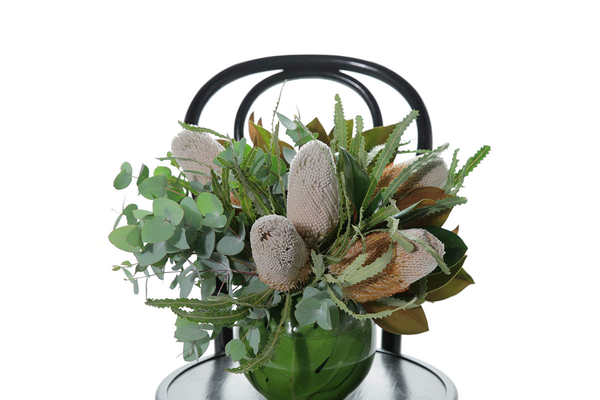 Kate Hill Flowers – native ball-vase design with Banksia, Protea, eucalyptus and magnolia foliage.