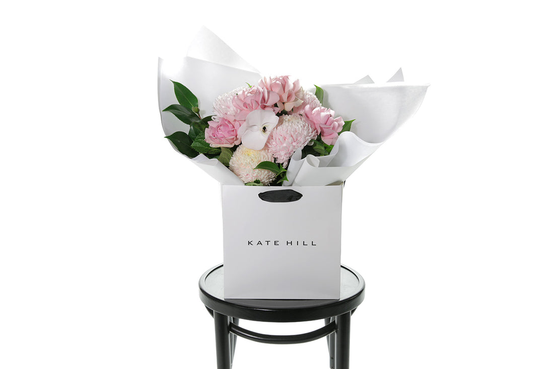 Kate Hill Flowers – medium blush and soft-pink birthday bouquet of roses, chrysanthemums and orchids, hand-tied.