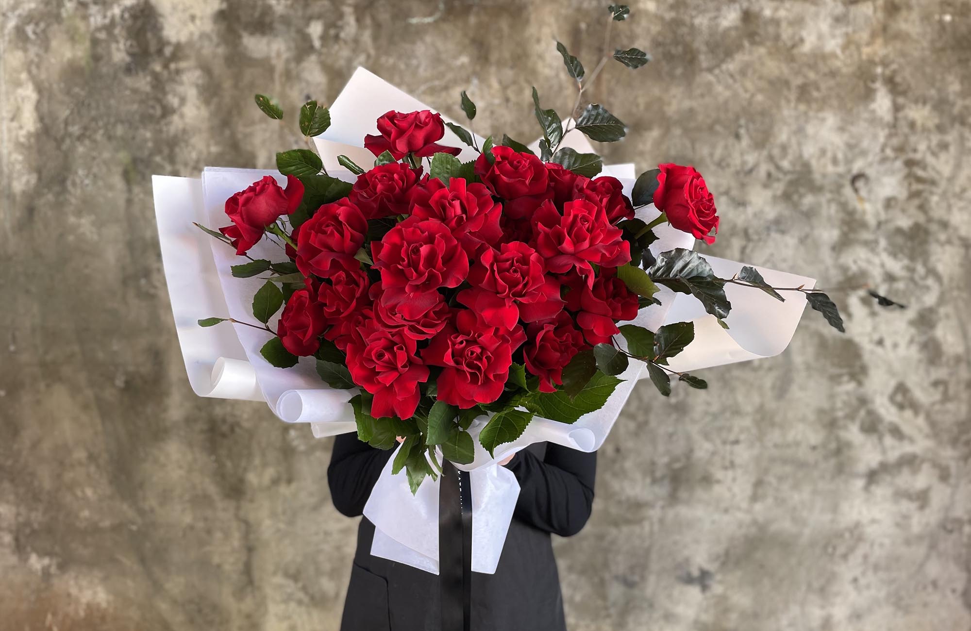 Red bouquet of rose flowers ready for delivery to Toorak