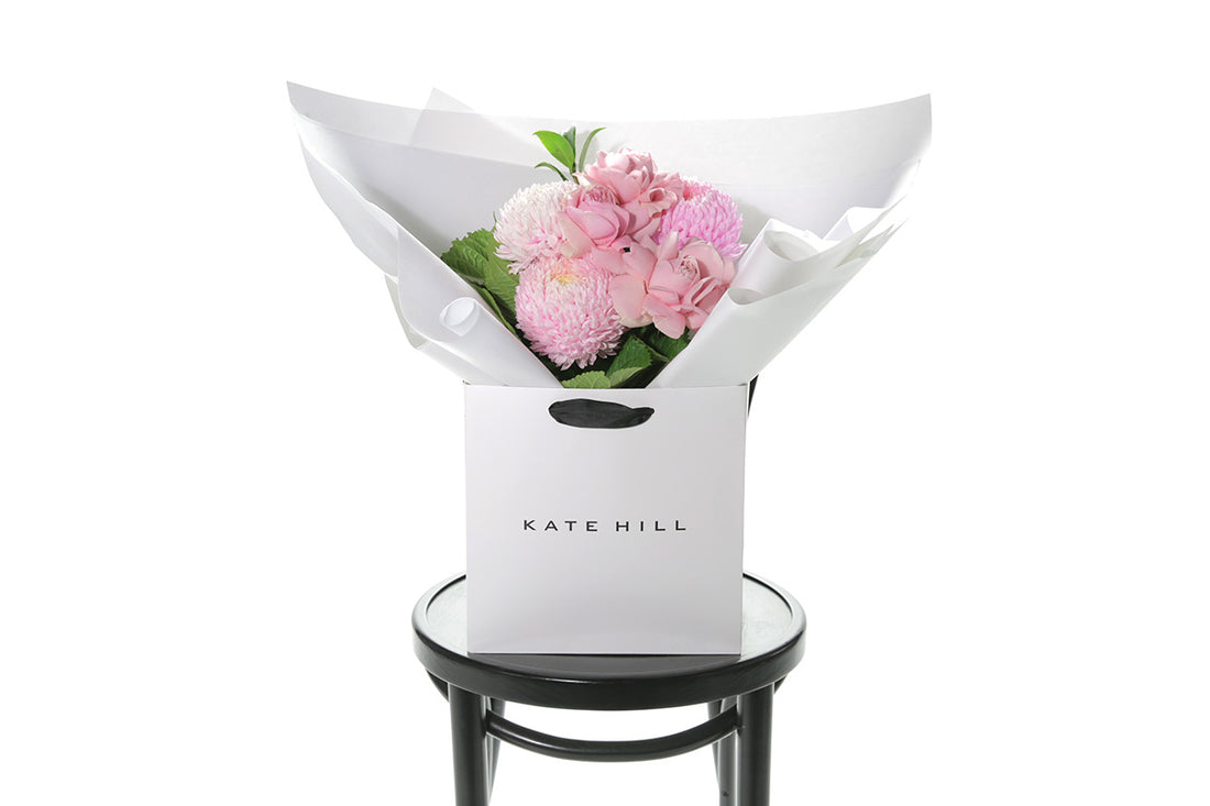 Kate Hill Flowers – small blush pink birthday posy with roses, disbuds and foliage hand-tied.