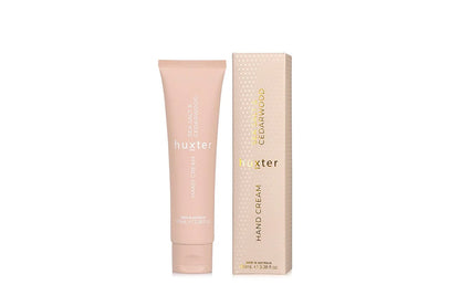 Huxster hand cream and packaging on a white background.