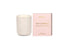 White Huxster soy candle with pink packaging on a white background