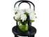 Close up image of a classic white and green ball vase design sitting on a black bentwood chair.