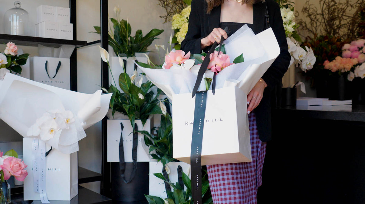 A Kate Hill Flowers bouquet held in the Southbank studio