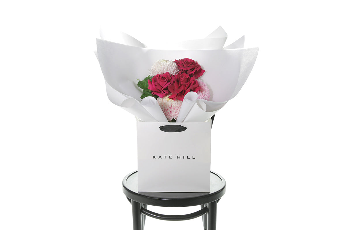 Kate Hill Flowers – small blush and hot-pink birthday posy with Floyd roses, hydrangeas and foliage hand-tied.