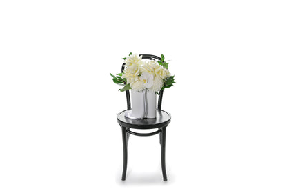 Kate Hill Flowers – white and lemon congratulations vase with roses, chrysanthemums, orchids and foliage in a white wave ceramic.