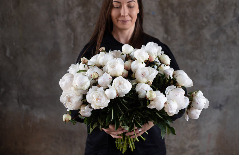 Melbourne Florist Holding White Flowers Ready for Delivery 