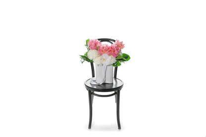 Kate Hill Flowers – medium white wave vase with white disbuds, blush roses and blush orchids.
