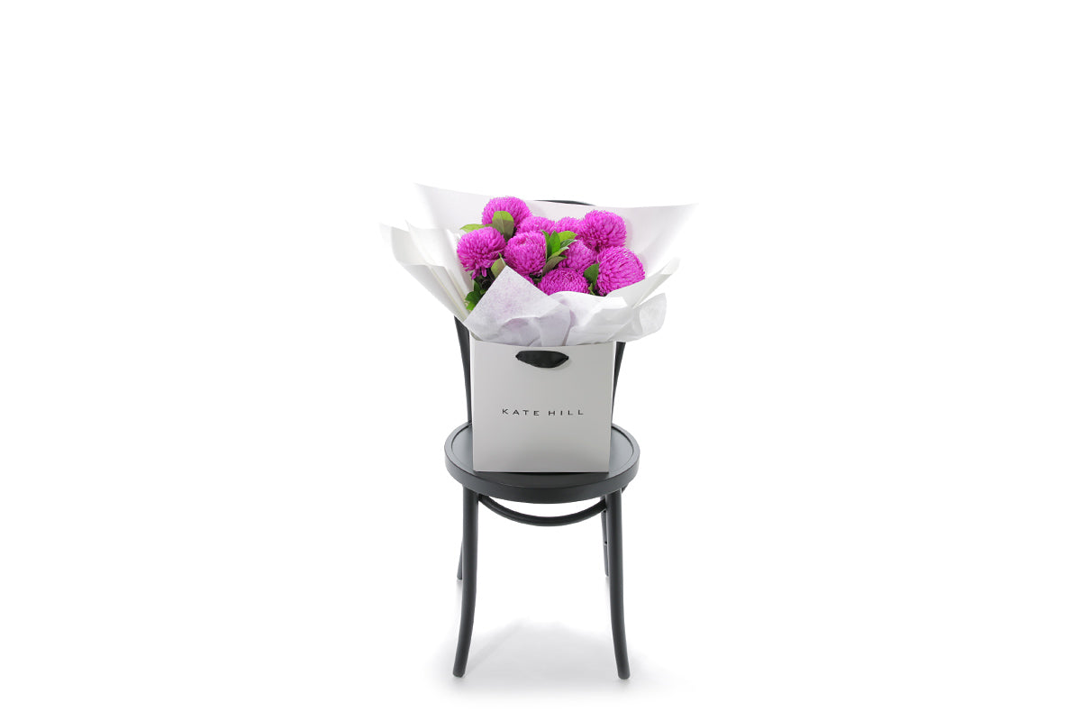 ARIA hot pink disbud bouquet in Kate Hill Flowers signature wrapping