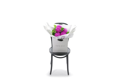ARIA small hot pink disbud bouquet in Kate Hill Flowers signature wrapping