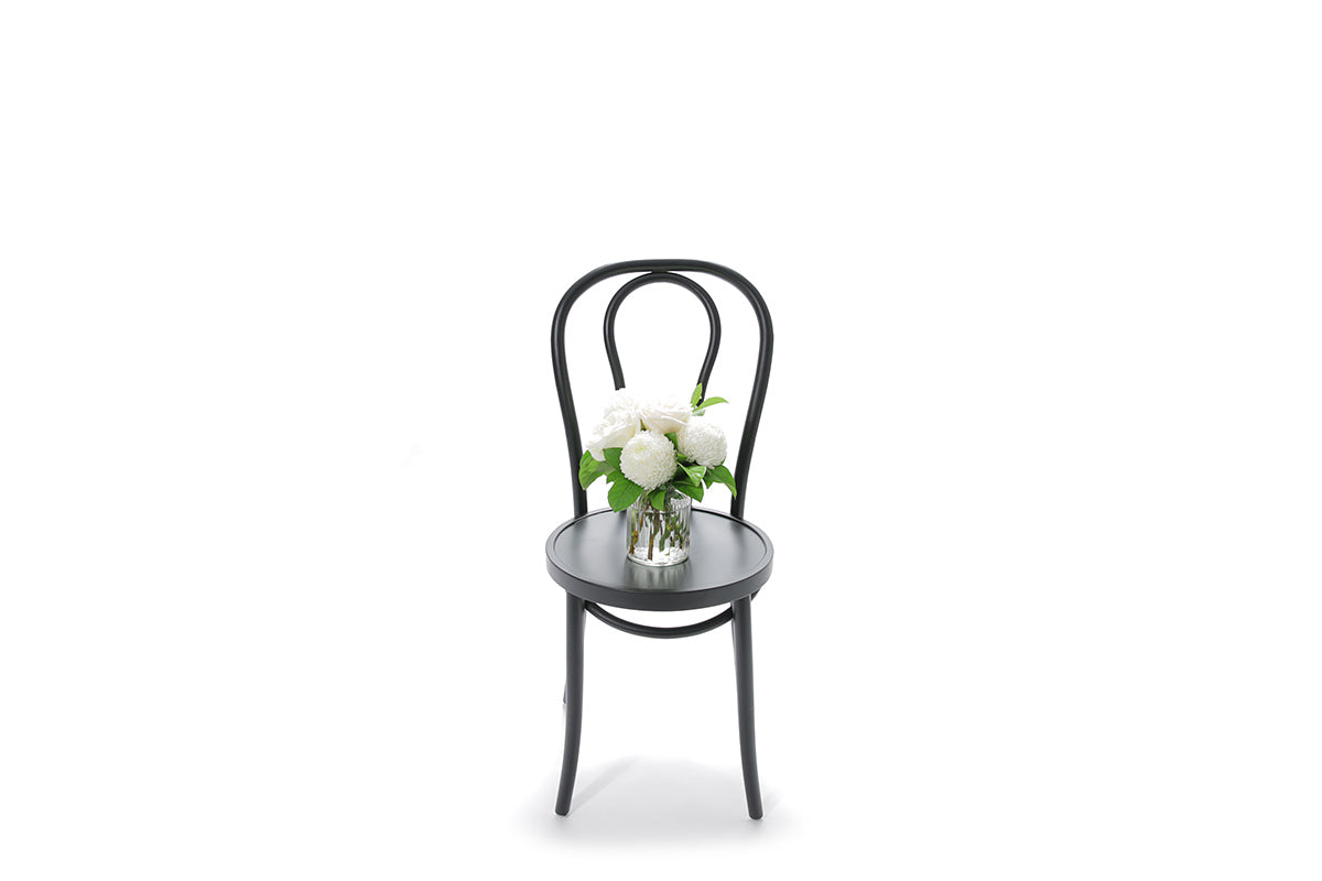 BAILEY white flowers in a ribbed glass vase