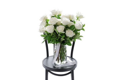 BLANCA large white roses in a tapered glass vase by Kate Hill Flowers Melbourne