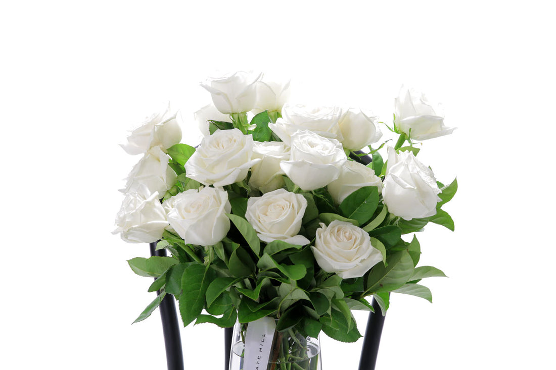 Close-up of BLANCA large tapered vase with white roses