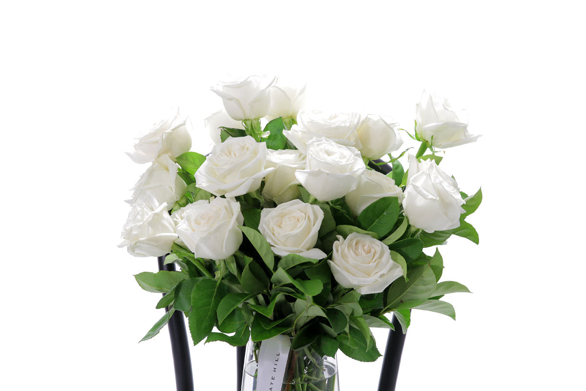 Close-up of BLANCA large tapered vase with white roses