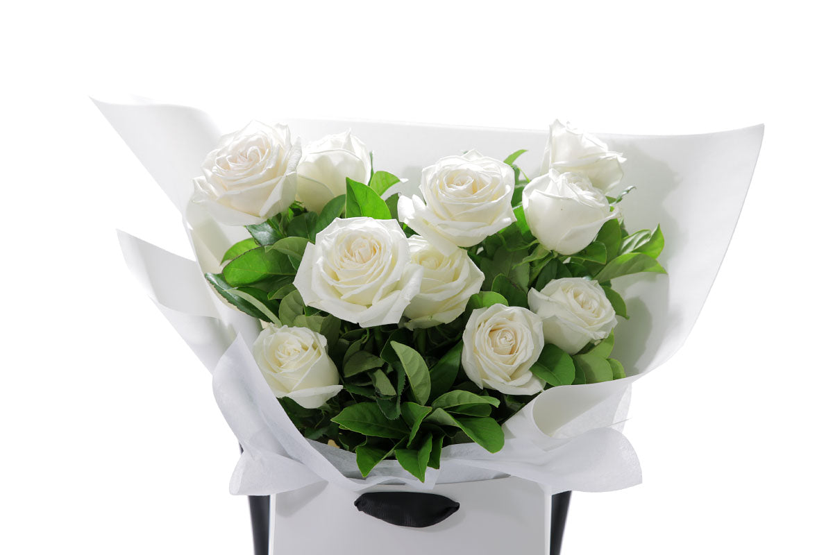 Close-up of BLANCA bouquet with white classic roses
