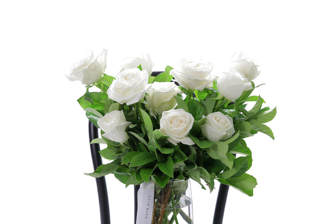 Close-up of BLANCA large tapered vase with white roses