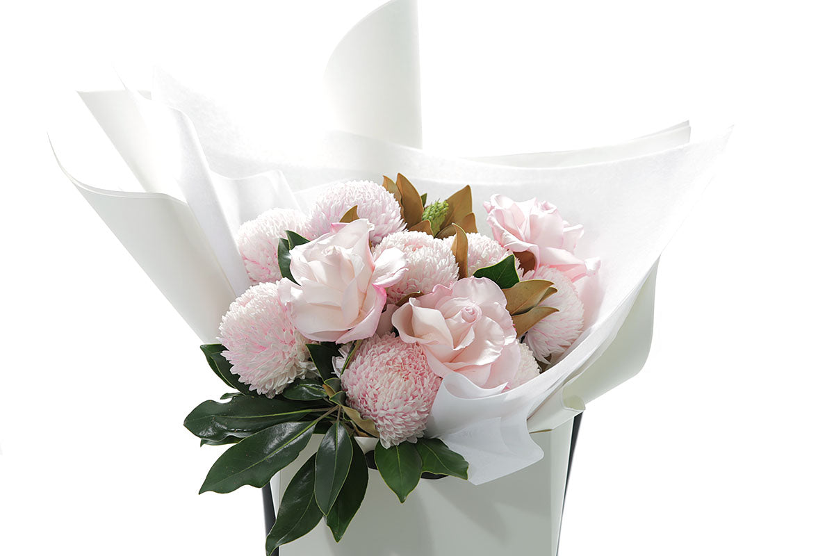 Close-up of CHLOE bouquet with soft blush and pink seasonal blooms