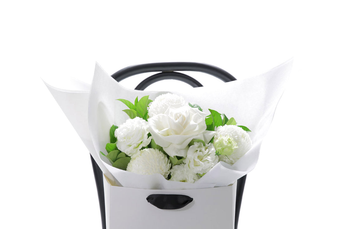 Close-up of ELLA small bouquet with seasonal white blooms