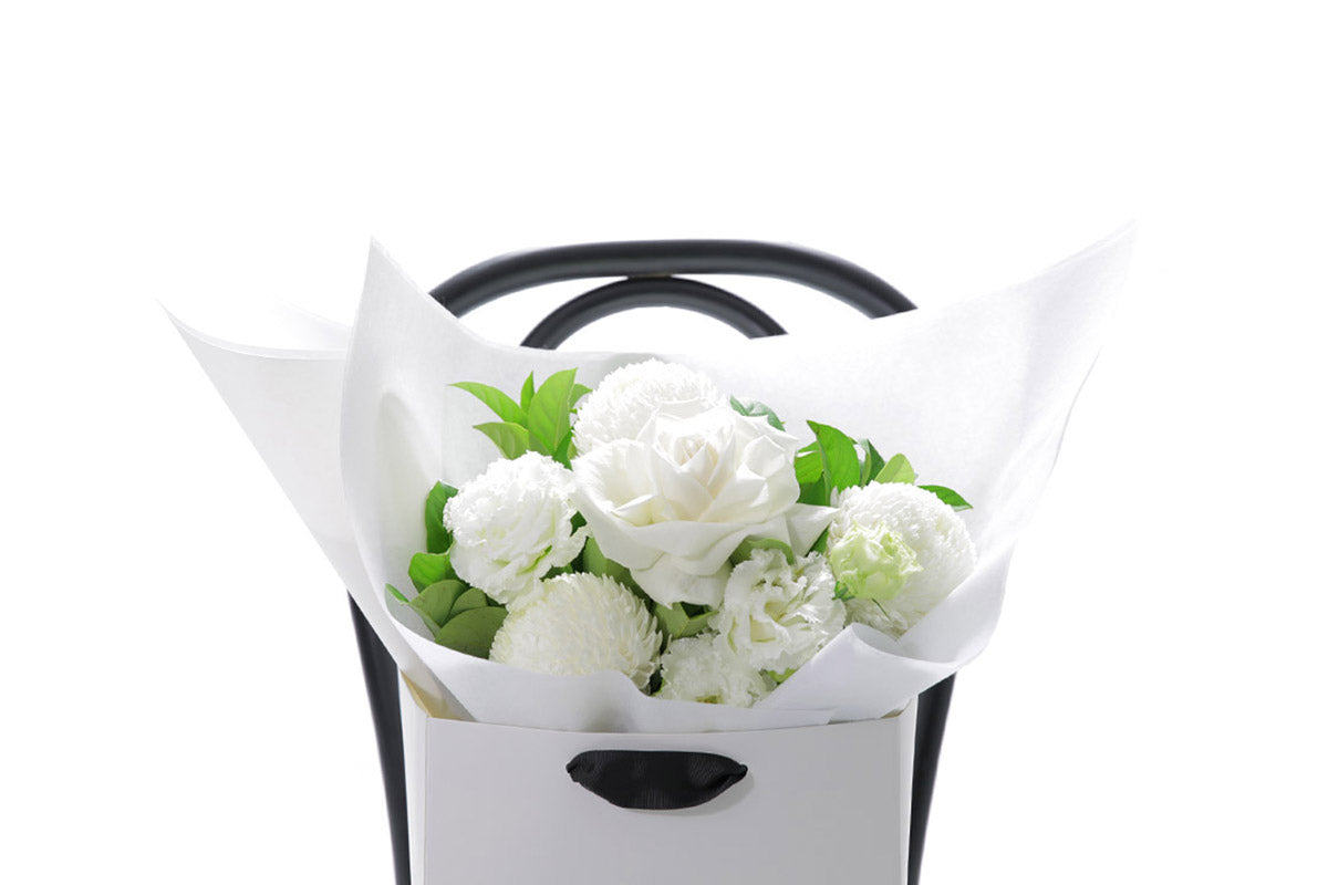 Close-up of ELLA small bouquet with seasonal white blooms